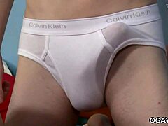 Twink Guys Lock Lips in Steamy 69 Oral Play