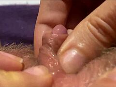 Big clit pulsing in extreme closeup orgasm.