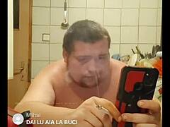 Solo stud strokes hard over desk in private