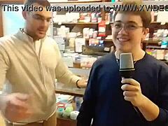 Fat guy bends over to insert microphone in ass