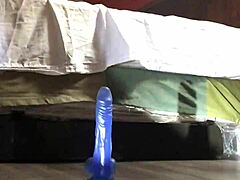 gay guy masturbates with dildo as people watch