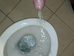 I am pissing solo in the bathroom, but I think I made a mess on the floor.