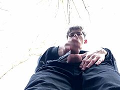 In the shadow, I stroke my 9 inches cock with a sexy European twink handjob outdoors.