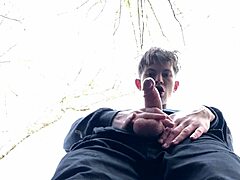 In the shadow, I stroke my 9 inches cock with a sexy European twink handjob outdoors.