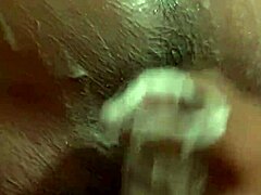 Young boy explores water adventures in bathroom close up.