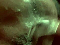 Young boy explores water adventures in bathroom close up.