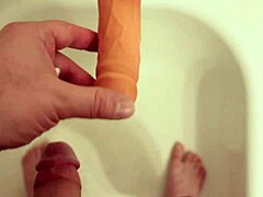 in a casual solo session, he grabs the dildo and starts thrusting while sucking it eagerly for fun.