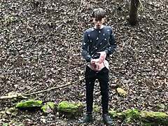 the horny cute european boy steps outdoors in snowy weather, stroking his big dick with intense focus until climax.