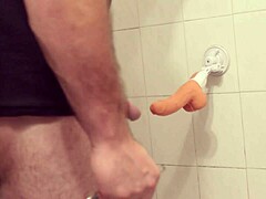 in a casual solo session, he grabs the dildo and starts thrusting while sucking it eagerly for fun.