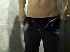 Guy strokes throbbing cock hard in public toilet outdoors