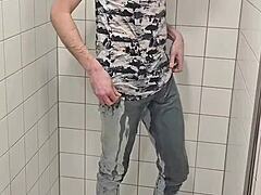 twink plays in shower jeans sneakers fully clothed wet fun