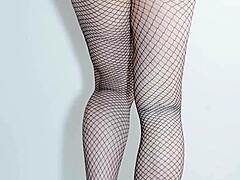 Black fishnet pantyhose tights show