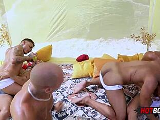 Young stud in gay beach foursome